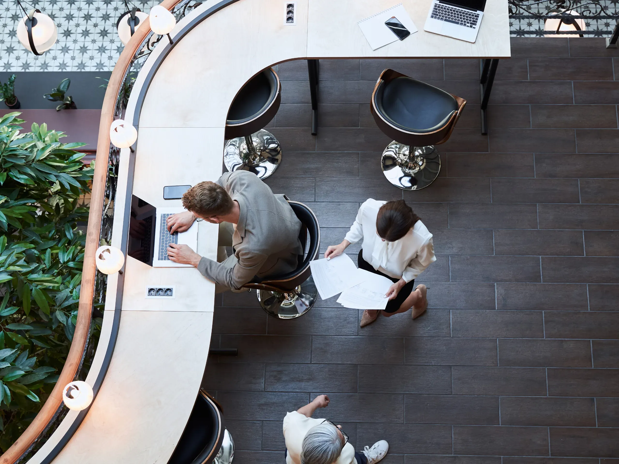 A modern, stylish office environment from above. 