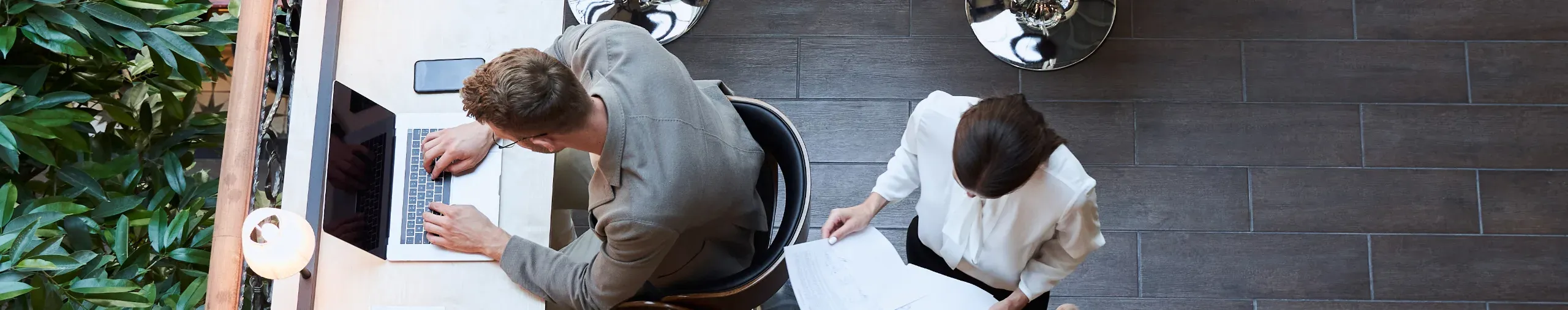A modern, stylish office environment from above. 