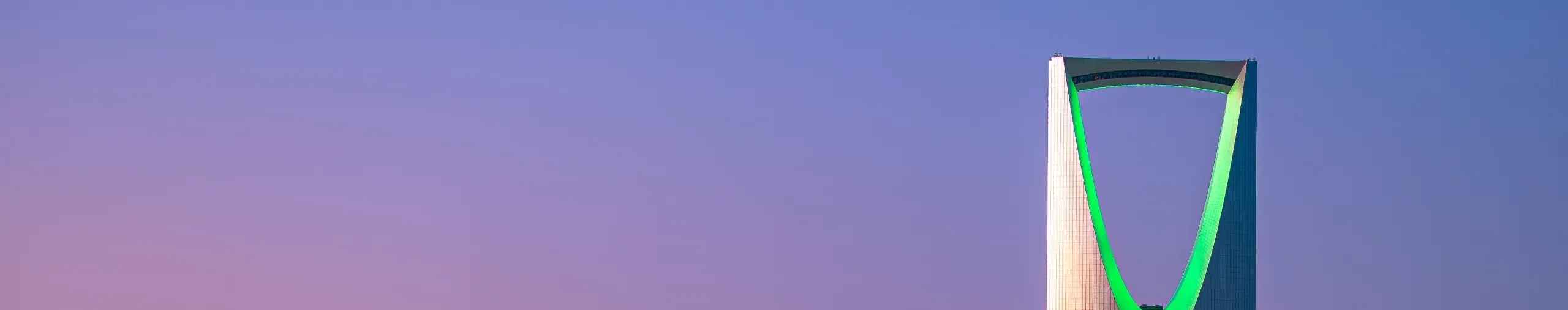 The skyline of Riyadh, Saudi Arabia, at dusk.